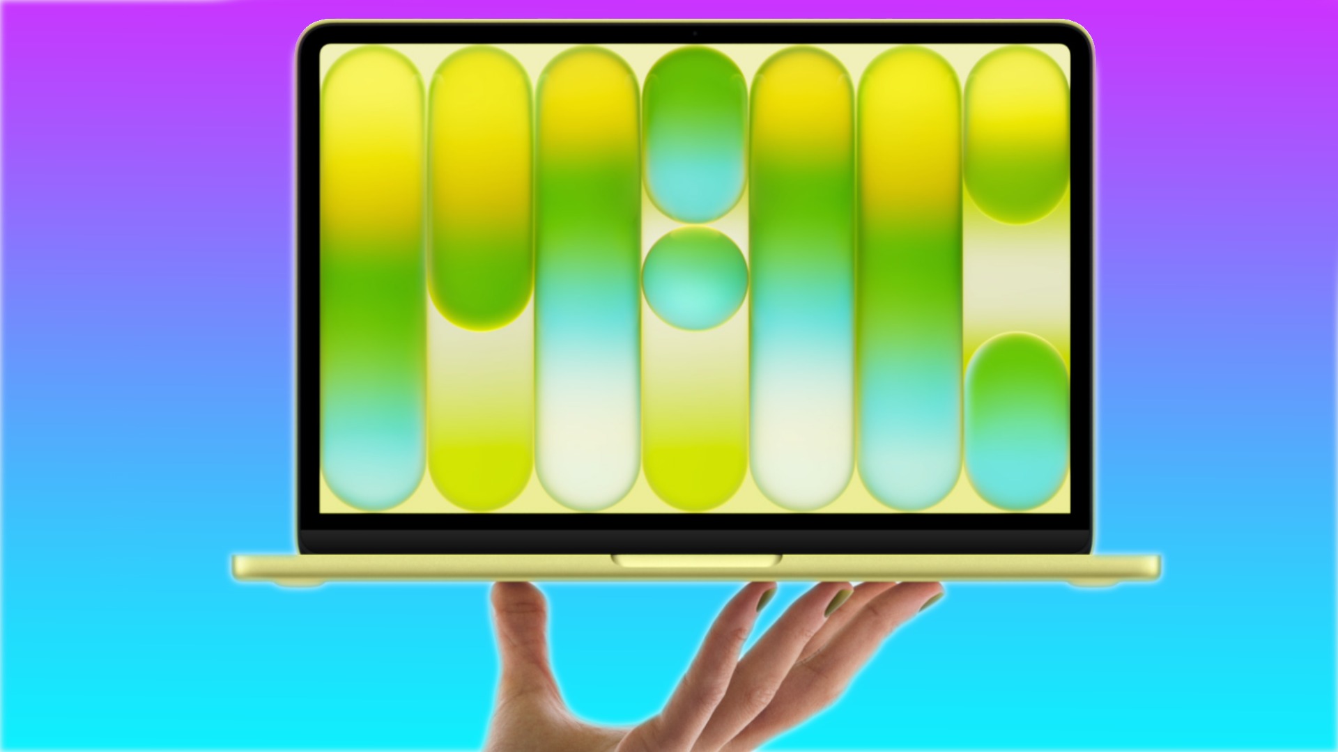 Apple MacBook Neo in Citrus colour, held up against a plain background